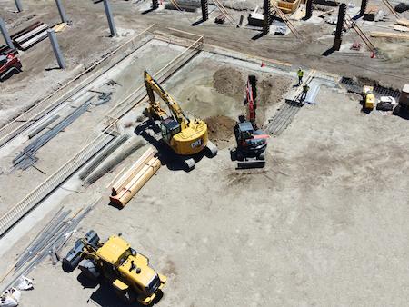 Drone shot of TROYCO excavating in preparation to lay a concrete foundation for a commerical project.