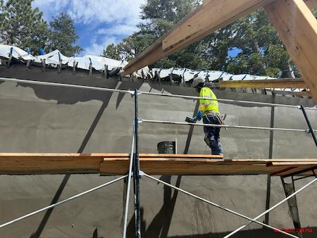 TROYCO finishing a shotcrete poured wall for a commerical resort in Mammoth Lakes, CA.